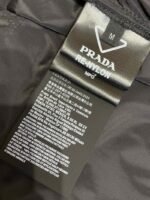 Prada Triangle Label Recycled Nylon Trousers - 图片 9
