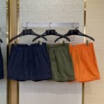 Prada Nylon Triangle Label Shorts Orange
