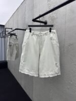 Balenciaga Distressed And Faded Light Gray Shorts