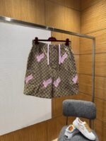 Gucci All-Over Letter Embroidered Shorts