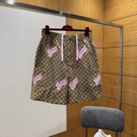 Gucci All-Over Letter Embroidered Shorts